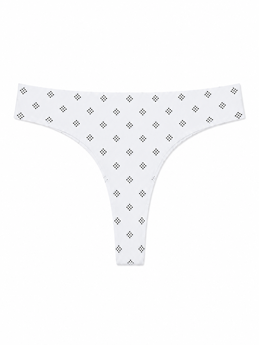 White thong underwear with a small black geometric diamond pattern repeated across the fabric, shown flat against a solid white background.