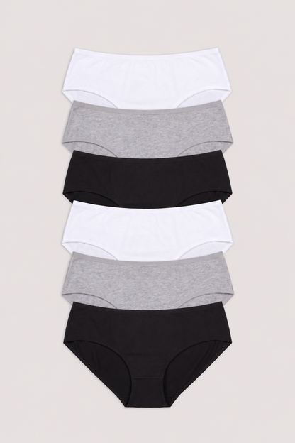 A stack of five women's briefs in alternating solid white and heather gray colors, arranged vertically on a light beige background.