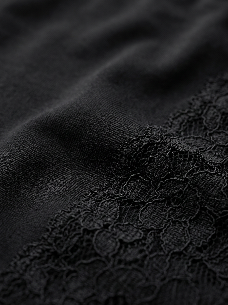 Close-up of black fabric with textured pattern
