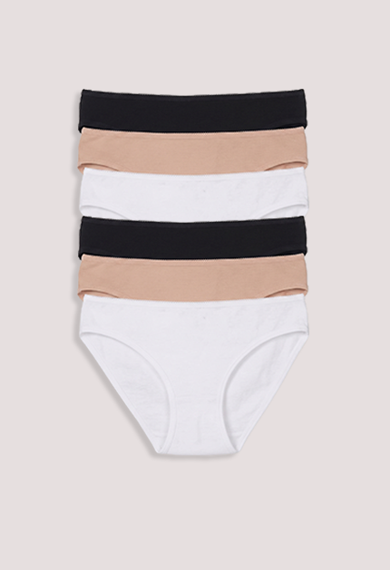 Set of striped underwear with black, beige, and white colors on a light gray background