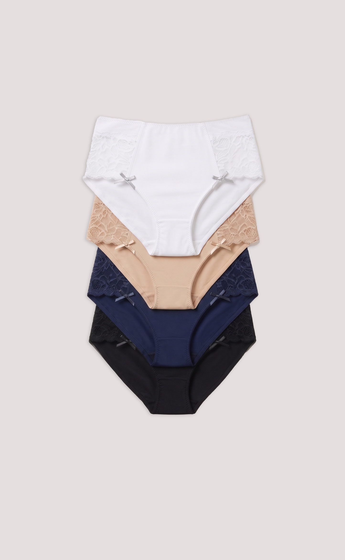 Stacked Microfiber full briefs for women in white, beige, and navy on a light gray background