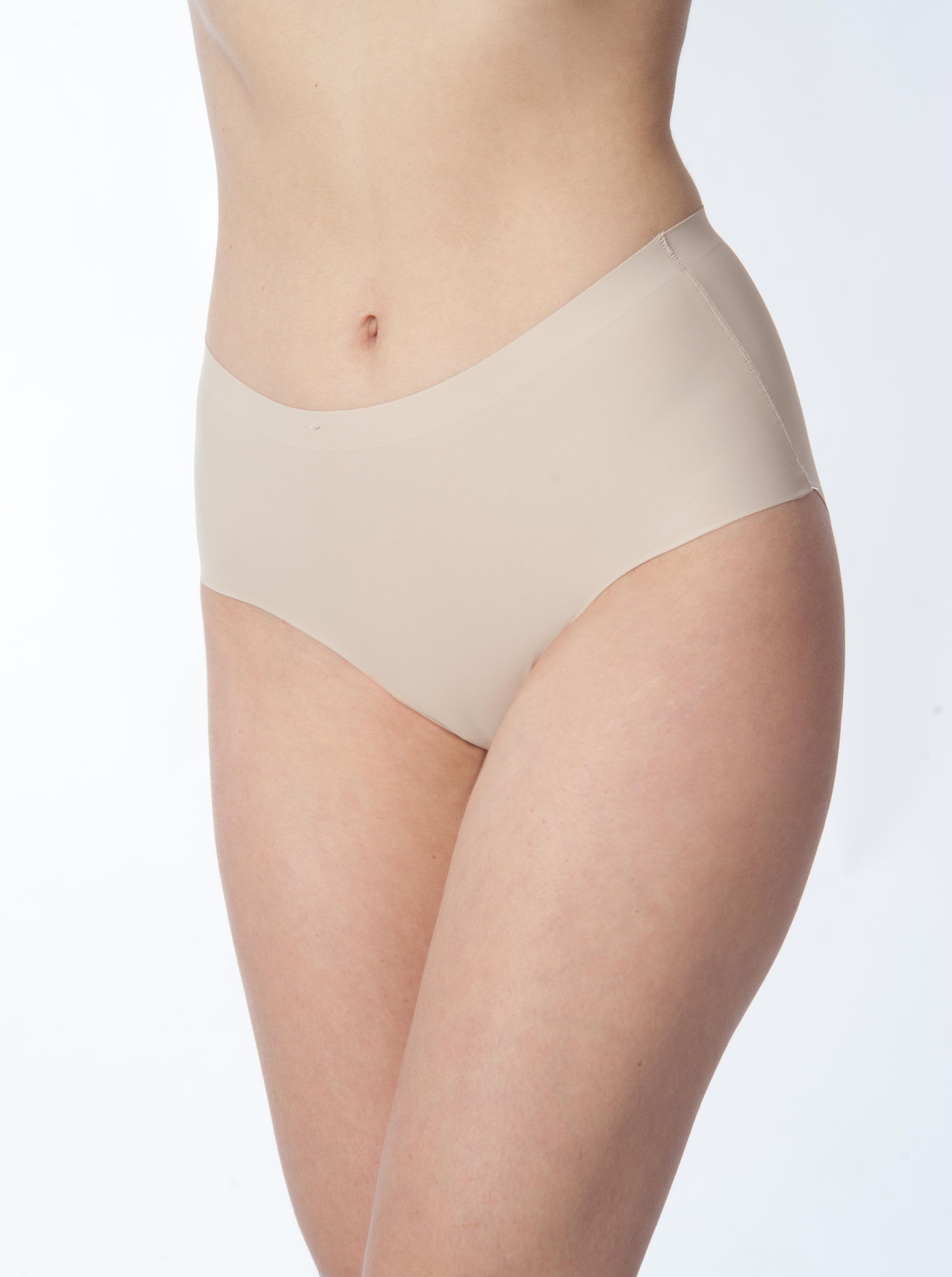 Beige underwear on a white background