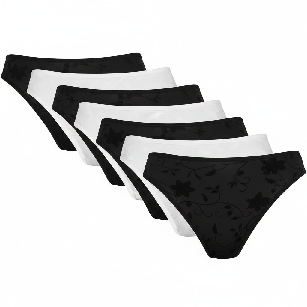Five pairs of women's bikini-style underwear are arranged in a fan shape on a white background. The front pair is light blue with a darker blue floral vine pattern, followed by pink, black, white, and purple pairs, each with a subtle tonal floral pattern.