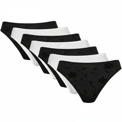 Five pairs of women's bikini-style underwear are arranged in a fan shape on a white background. The front pair is light blue with a darker blue floral vine pattern, followed by pink, black, white, and purple pairs, each with a subtle tonal floral pattern.