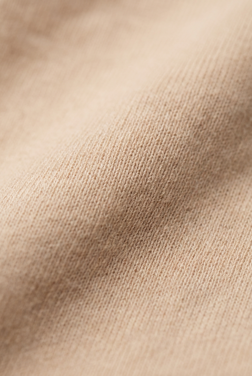 Close-up of beige fabric texture