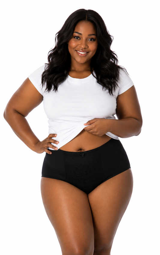 Woman wearing a white t-shirt and black high-waisted shorts on a white background